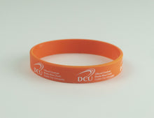 Load image into Gallery viewer, DCU Rubber Wristband
